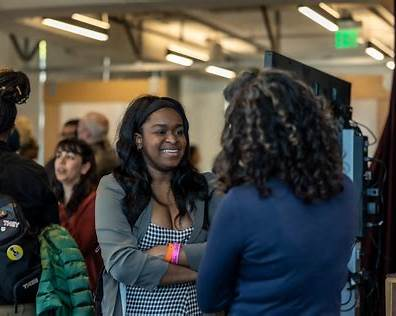 Two women networking at a BCGA Foundation event